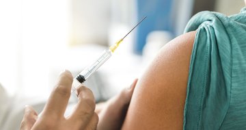person getting a flu shot
