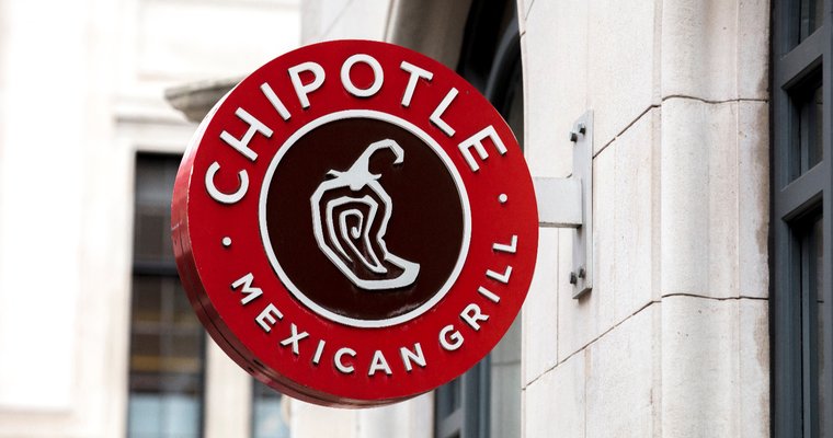sign hanging off a Chipotle store location
