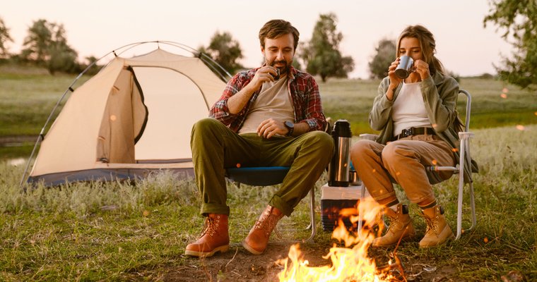 a couple at a campsite