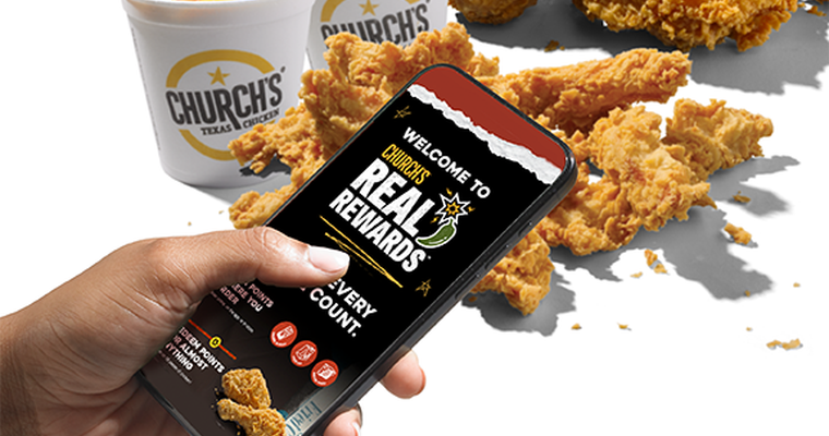 a hand holding a phone with Church's Texas Chicken on it