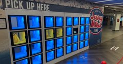 Jersey Mikes smart lockers, blue lit compartments are empty, yellow lit compartments contain orders