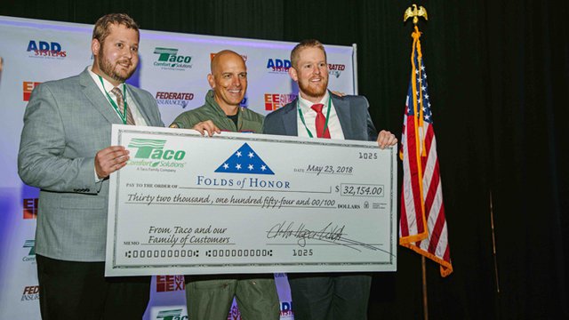 Taco presents Folds of Honor with donation
