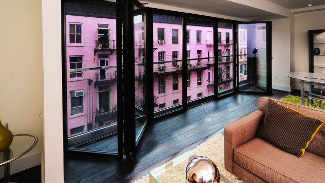 Renovated Tenement Features Window Walls